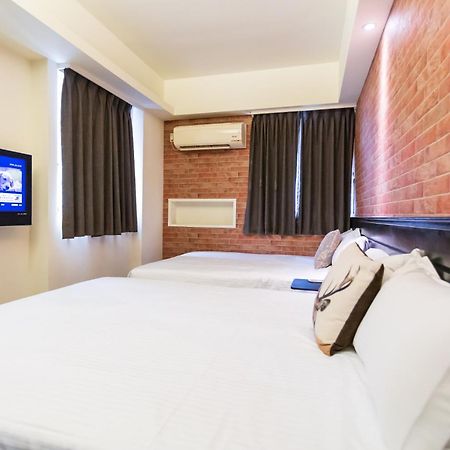 Newrise Hotel Каосюн Екстериор снимка