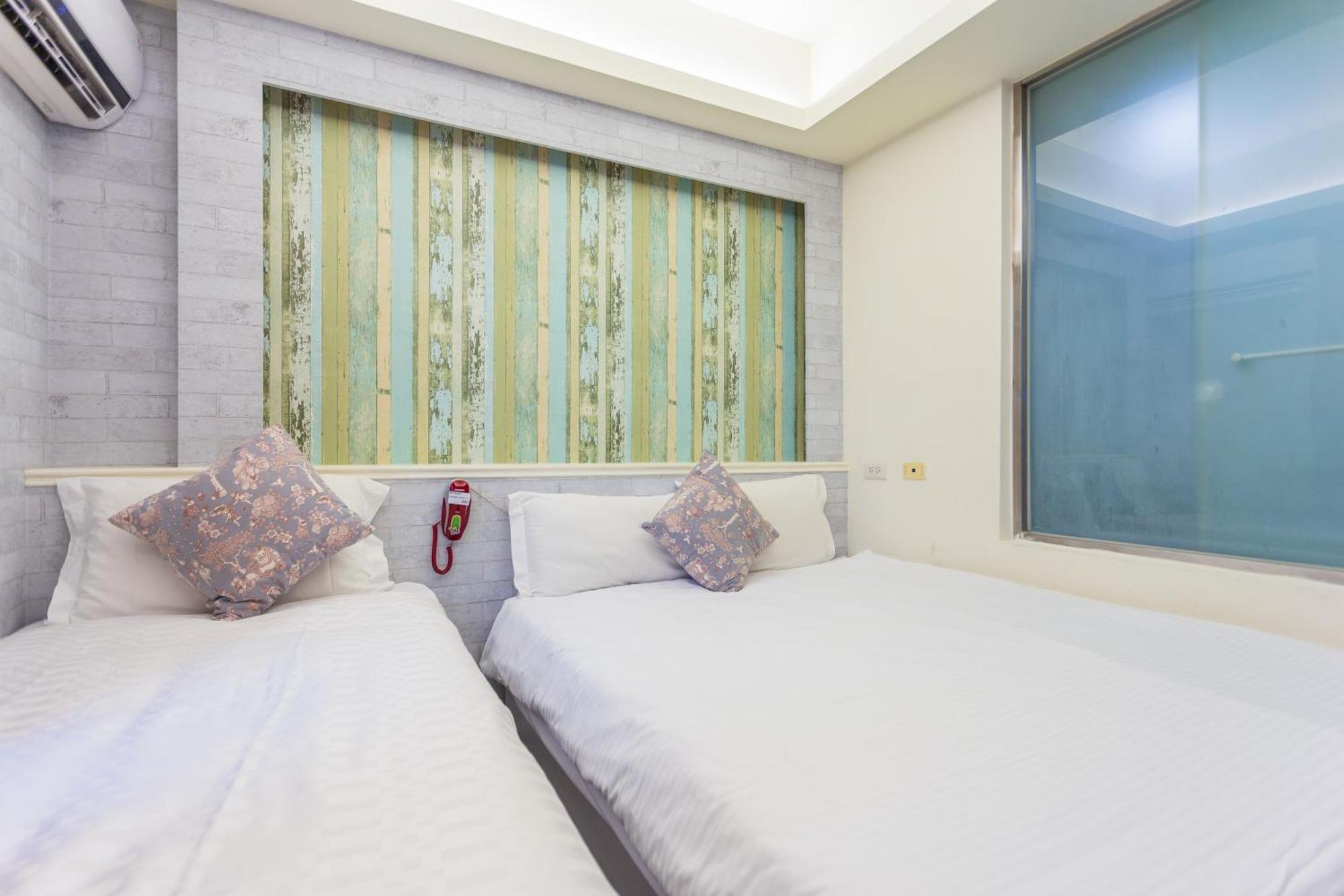 Newrise Hotel Каосюн Екстериор снимка
