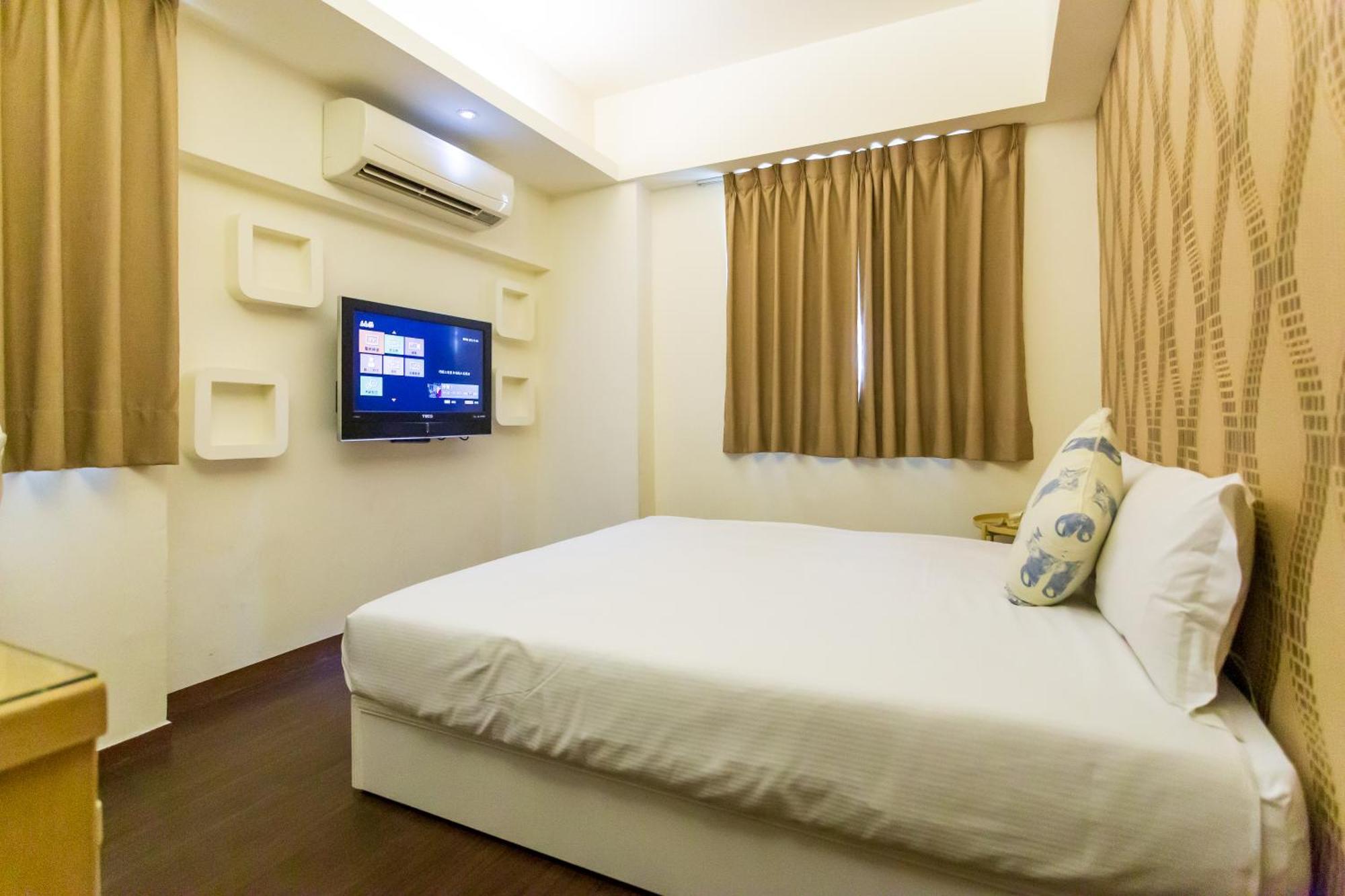 Newrise Hotel Каосюн Екстериор снимка