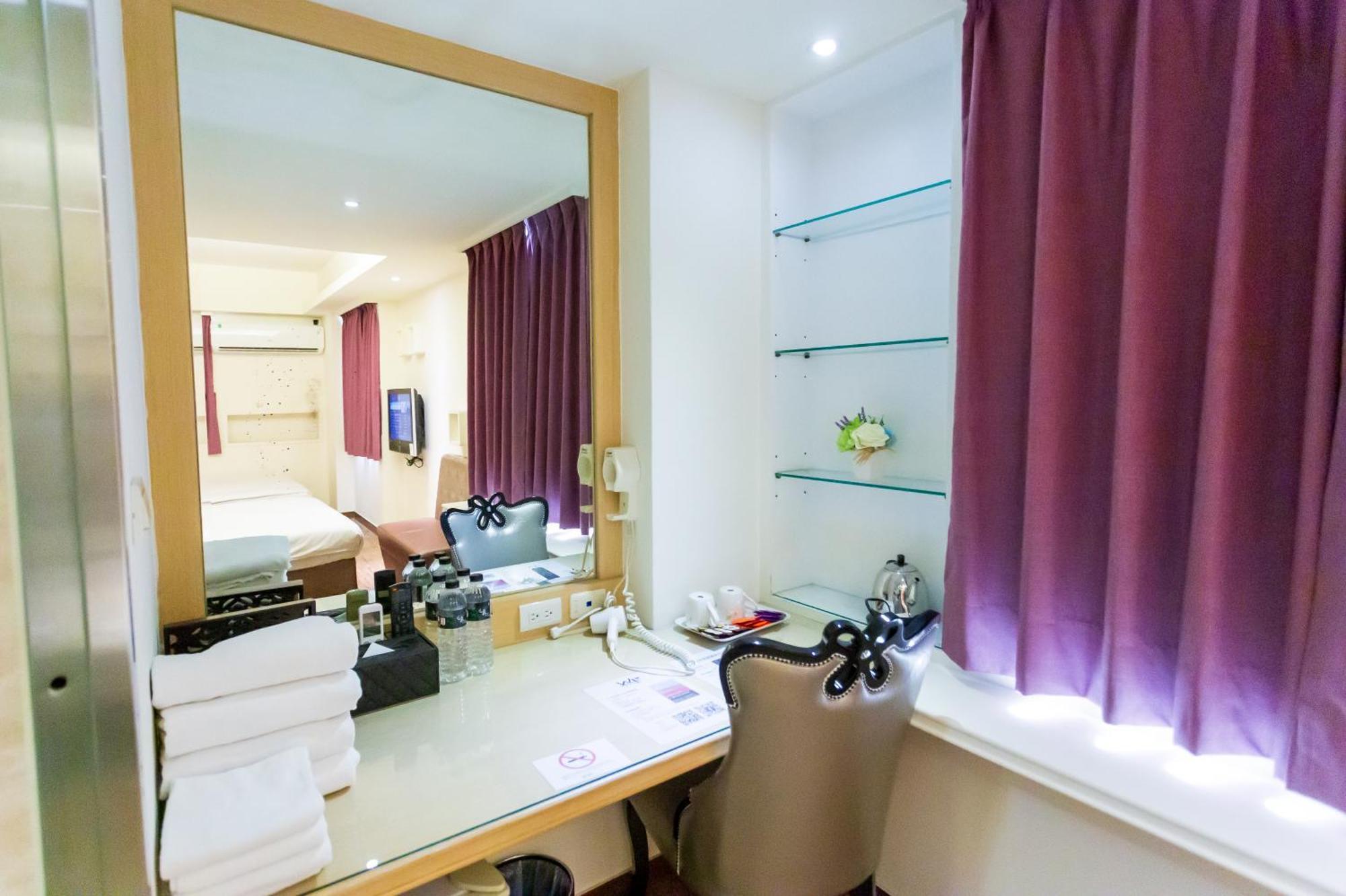 Newrise Hotel Каосюн Екстериор снимка