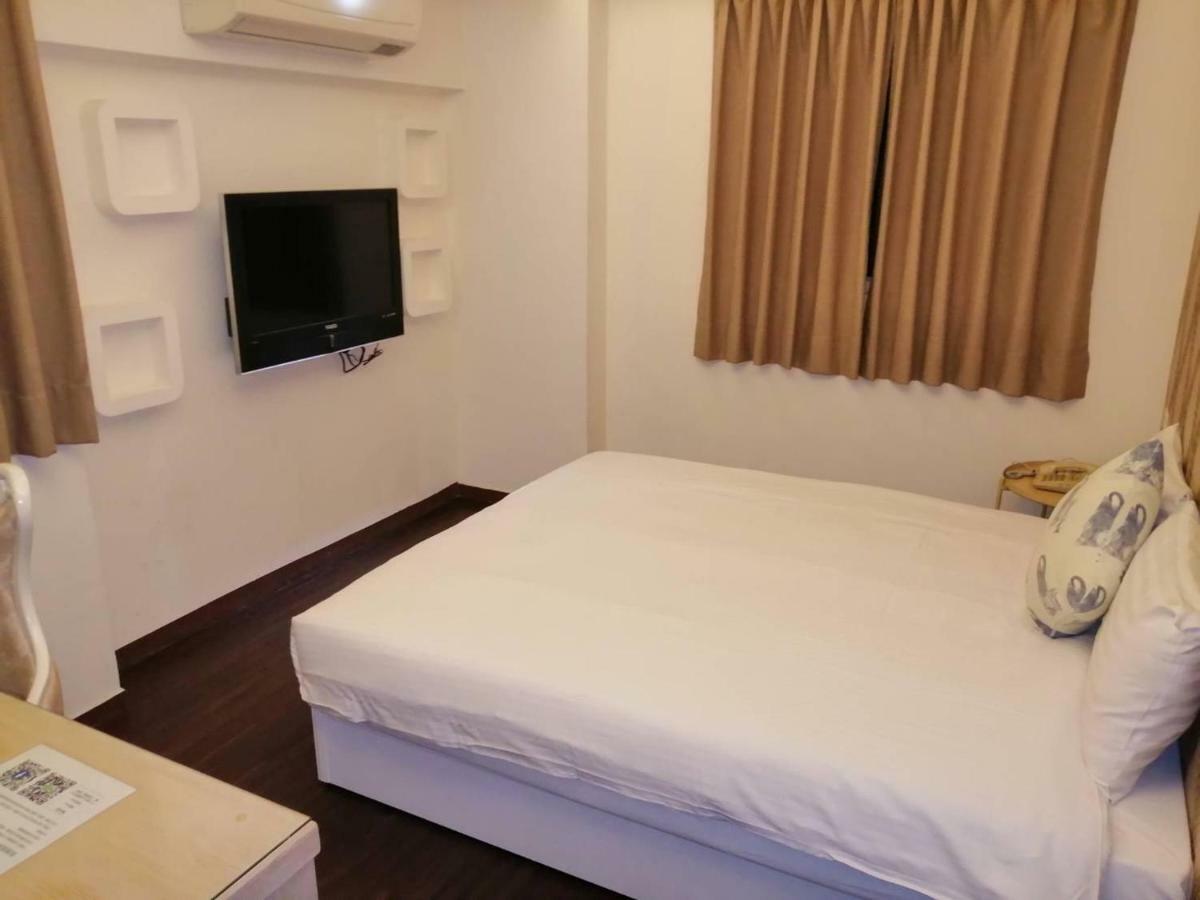 Newrise Hotel Каосюн Екстериор снимка