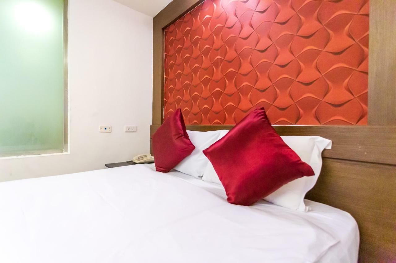 Newrise Hotel Каосюн Екстериор снимка